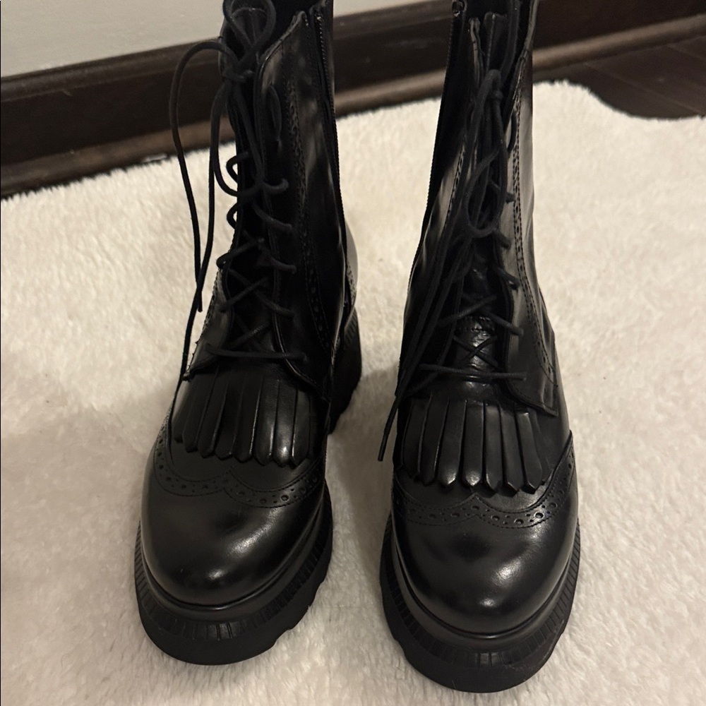 Black Combat Boots with Kiltie Fringe
